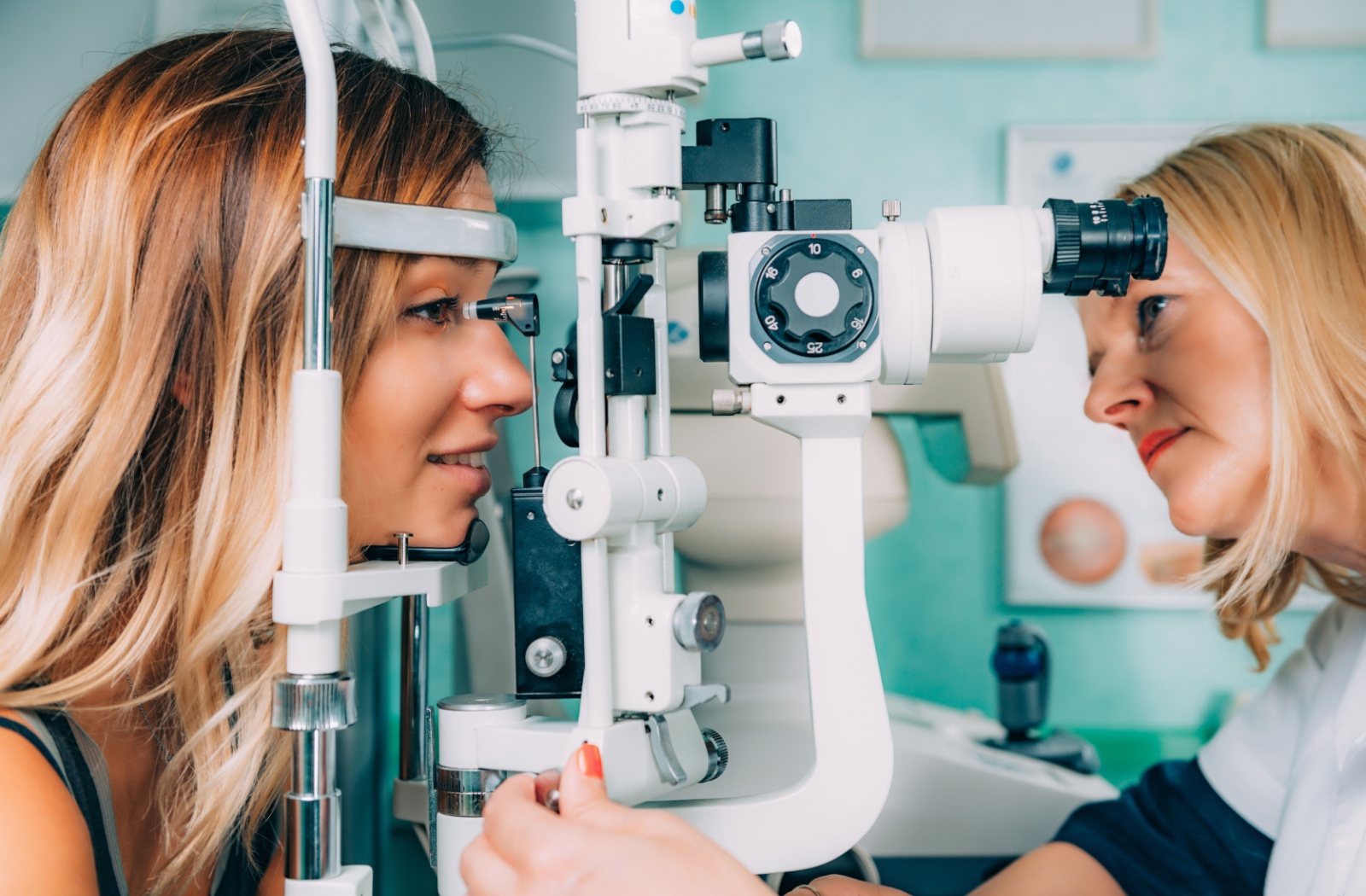 Young adult woman during applanation tonometry test.