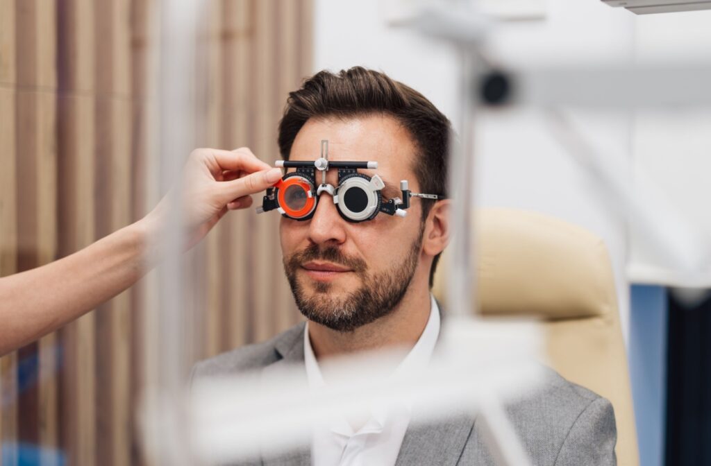 An adult gets a comprehensive eye exam to check their eye health and update their prescription.