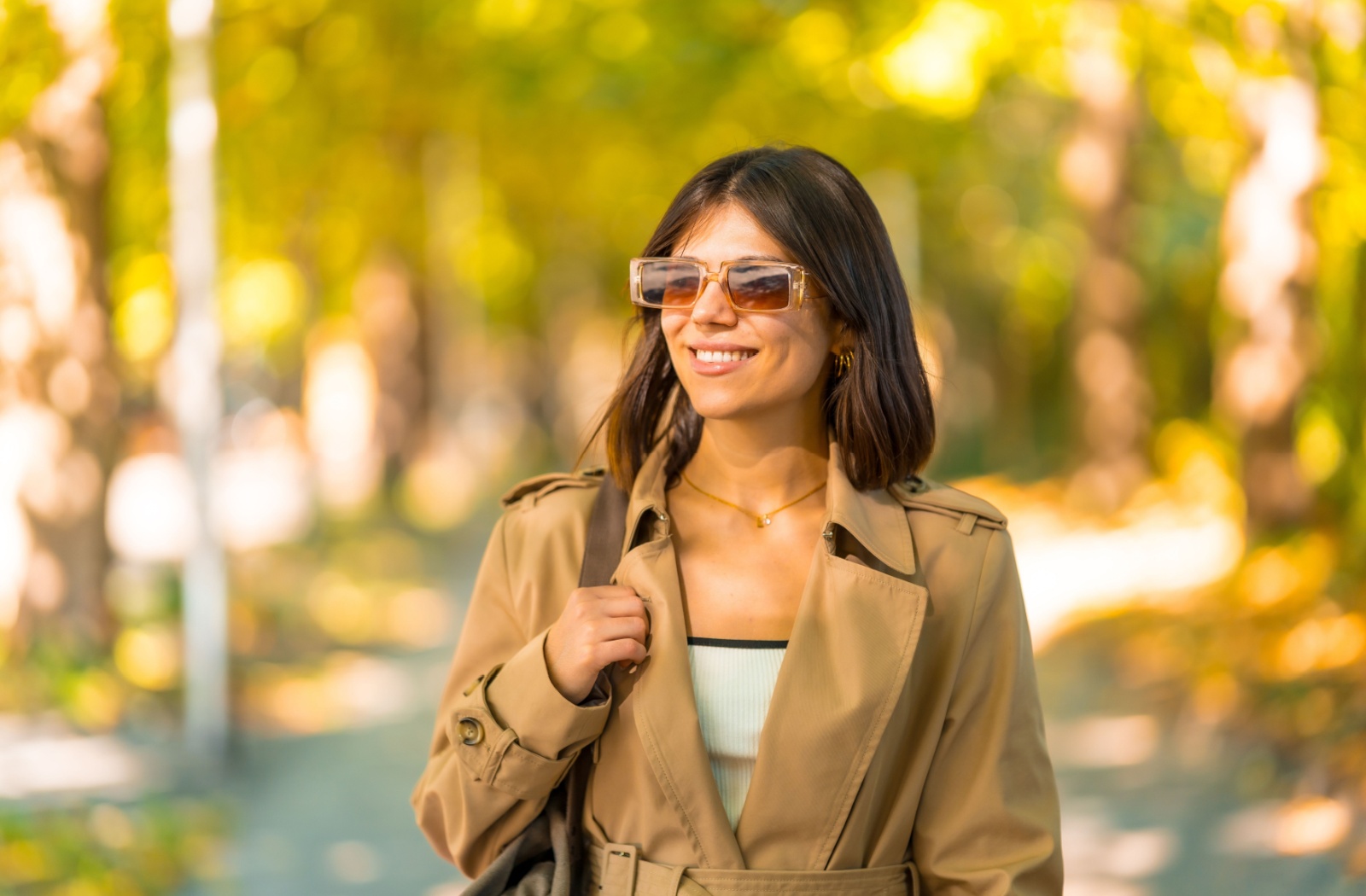 A person outside wearing prescription sunglasses.